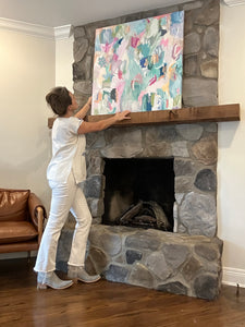 Local Artist Christine Mueller Hanging one of her Art Prints above a mantel, Colorful Abstract Wall Art, vivid bright canvas painting, modern home decor, large fine art, multicolor abstract wall art, christine mueller art, abstract artist, southern female artist